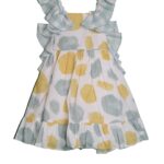 Abito bianco con pois e bretelle da bambina della marca Marta y Pau